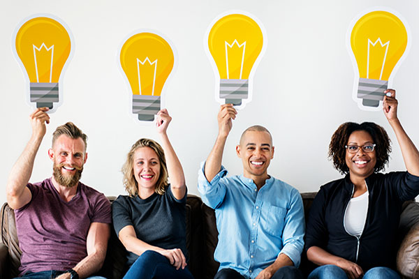 people carrying light bulb icons